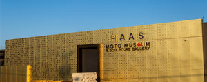 The golden facade of the Haas Moto Museum.